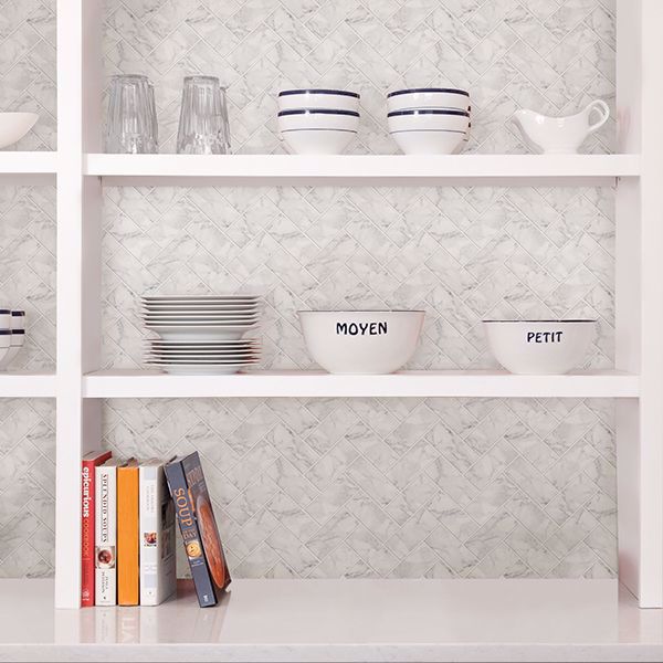 carrara herringbone backsplash